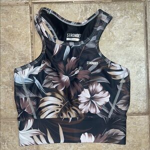Black cropped tank top with tropical floral print